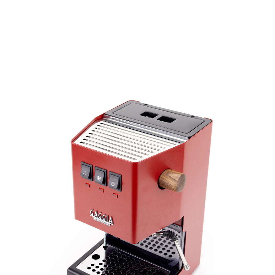 Stainless cup rest grid in mirror finish on top of a Gaggia Classic