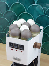 Extended top cover with espresso cups warming on top