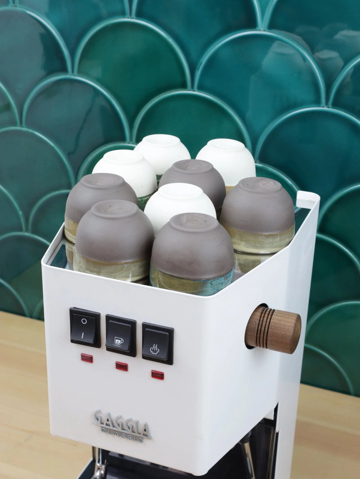 Extended top cover with espresso cups warming on top